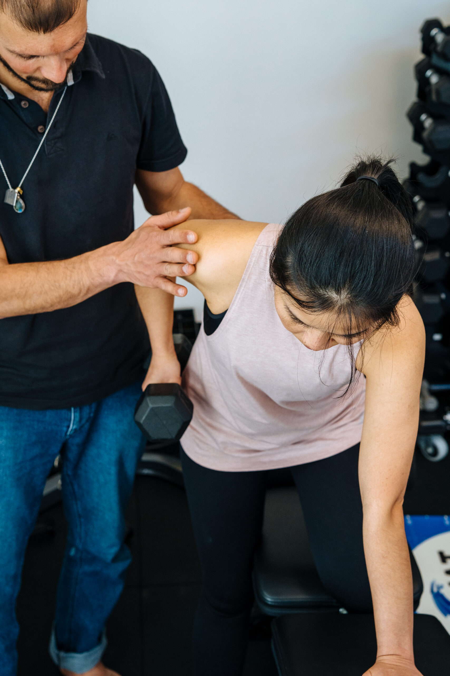 Giovanni during a Myotherapy Session in Fitzroy North guiding the client on how to do exercises